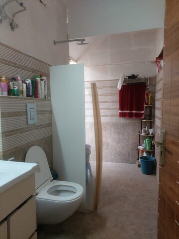 Bathroom in 4 BHK Builder Floor at Shalimar Nest, Vasant Kunj – for Rent