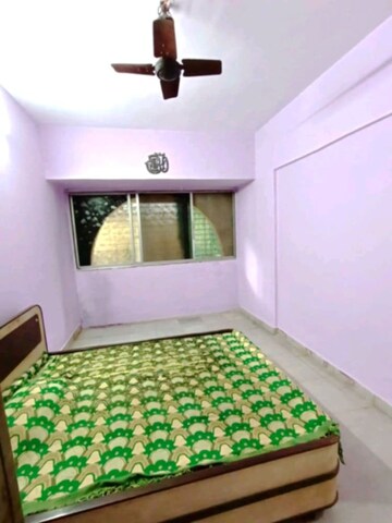 Bedroom in 1 BHK Apartment at Mallikarjun CHSL, Dahisar West – for Rent