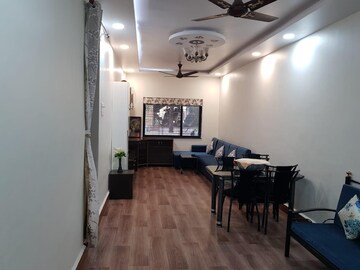 Living Room in 2 BHK Apartment at Woodland Avenue, Kothrud – for Rent