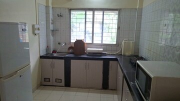 Kitchen in 2 BHK Apartment at Koregaon Park CHS, Koregaon Park – for Rent