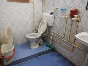 Bathroom in 3 BHK Builder Floor at Shalimar Garden Extension I – for Sale