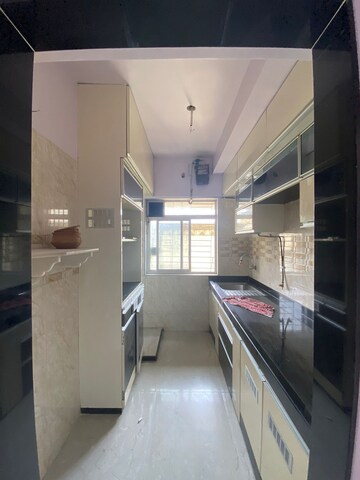 Kitchen in 1 BHK Apartment at The Baya Goldspot, Andheri East – for Rent