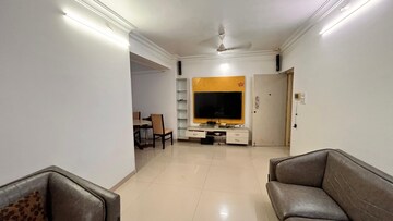 Living Room in 2 BHK Apartment at Palm Project CHS, Malad West – for Rent