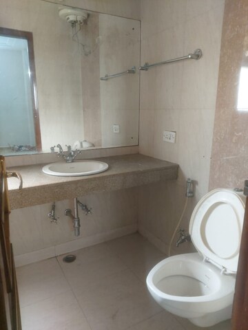Bathroom in 4 BHK Builder Floor at Green Park Extension – for Rent