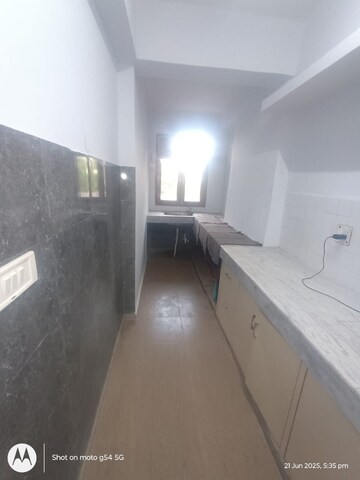 Kitchen in 3 BHK Apartment at Raavi Apartments, Vikas Puri – for Sale