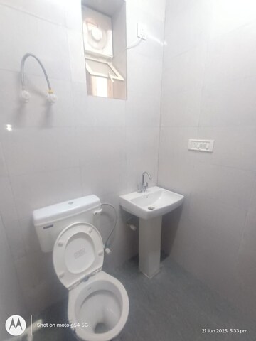 Bathroom in 3 BHK Apartment at Raavi Apartments, Vikas Puri – for Sale