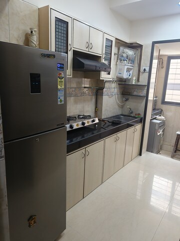 Kitchen in 2 BHK Apartment at K Rahega Palm Springs, Malad West – for Sale