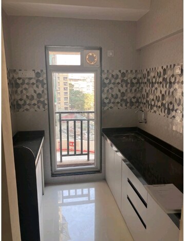 Kitchen in 1 BHK Apartment at Raunak Bliss, Ghodbunder Road – for Rent