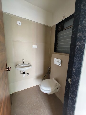 Bathroom in 2 BHK Apartment at Je And Vee Om Trimurti, Malad East – for Rent