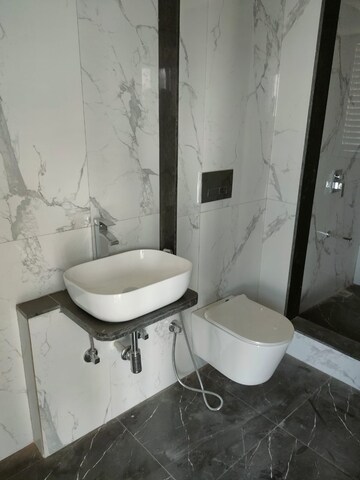 Bathroom in 2 BHK Apartment at Ruparel Ariana, Parel – for Rent