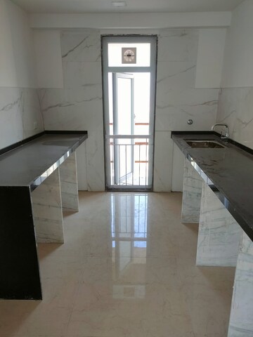 Kitchen in 2 BHK Apartment at Ruparel Ariana, Parel – for Rent