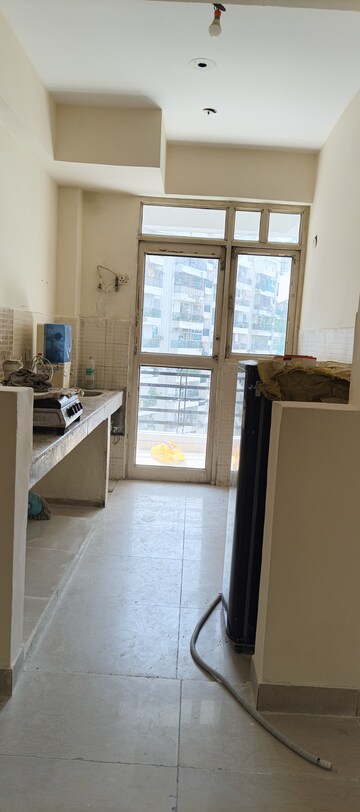 Kitchen in 2 BHK Apartment at Bulland Heights, Sain Vihar – for Sale
