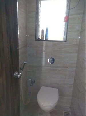 Bathroom in 1 BHK Apartment at Squarefeet Joy square, Kasarvadavali – for Sale