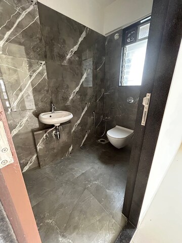 Bathroom in 2 BHK Apartment at Dinaco Darshan CHS, Dahisar West – for Rent