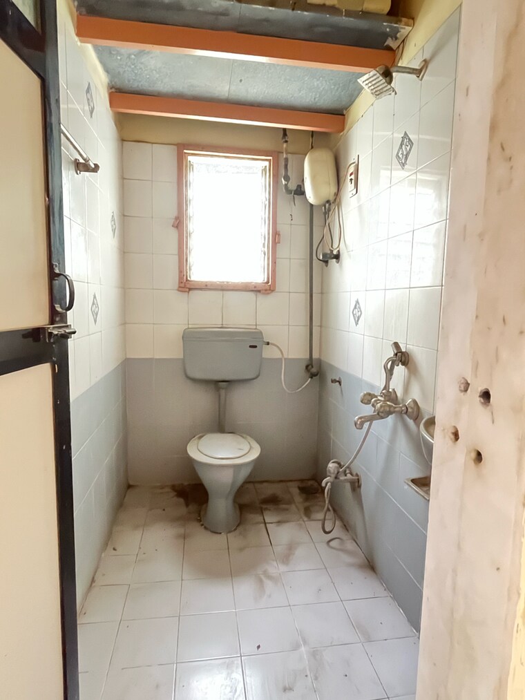 Bathroom, new-brahmand-phase-7-chs 2 Bedroom 650 Sq.Ft. Apartment In Kiran Mill Colony Thane 8951234