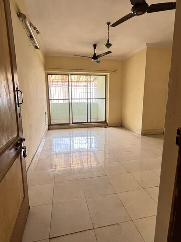 Kitchen in 2 BHK Apartment at New Brahmand Phase 7 CHS, Kiran Mill Colony – for Sale