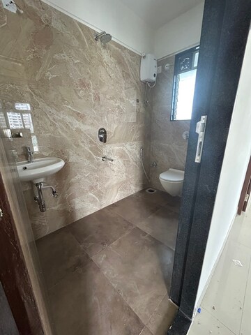 Bathroom in 1 BHK Apartment at Dinaco Darshan CHS, Dahisar West – for Rent