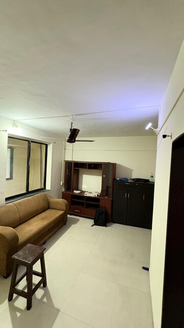 Living Room in 1 BHK Apartment at Ganga Puram CHS, Viman Nagar – for Rent