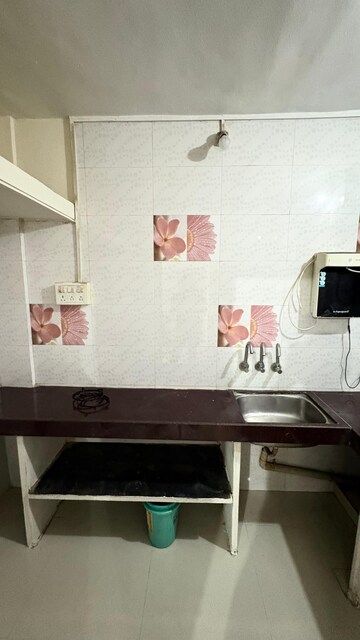 Kitchen in 1 BHK Apartment at Ganga Puram CHS, Viman Nagar – for Rent