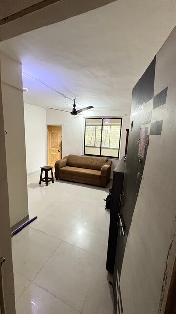 Living Room in 1 BHK Apartment at Ganga Puram CHS, Viman Nagar – for Rent