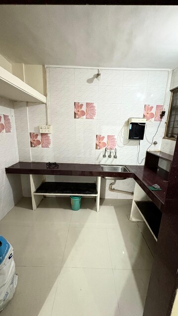 Kitchen in 1 BHK Apartment at Ganga Puram CHS, Viman Nagar – for Rent