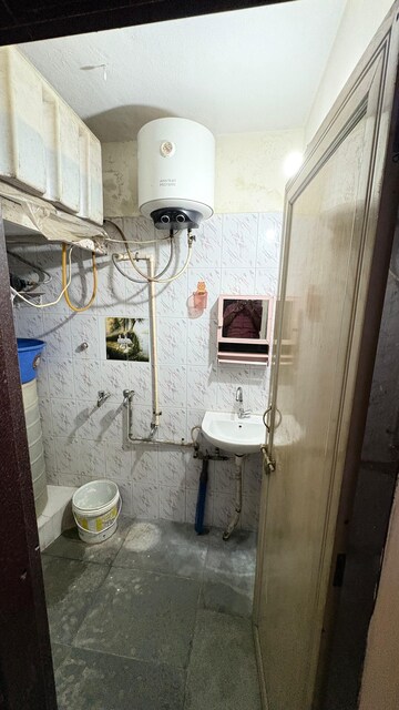 Bathroom in 1 BHK Apartment at Ganga Puram CHS, Viman Nagar – for Rent