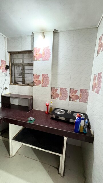 Kitchen in 1 BHK Apartment at Ganga Puram CHS, Viman Nagar – for Rent
