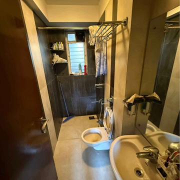 Attached Bathroom in 2 BHK Apartment at Shanti Verve Mansion, Ma Marg – for Rent