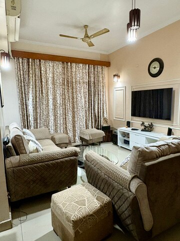 Living Room in 4 BHK Apartment at Uninav Bliss, Raj Nagar Extension – for Rent