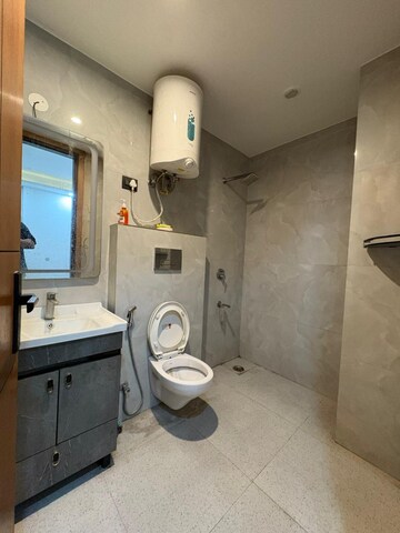Bathroom in 2 BHK Builder Floor at Chattarpur – for Rent