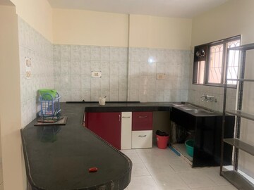 Kitchen in 3 BHK Apartment at Kunal Icon, Pimple Saudagar – for Sale