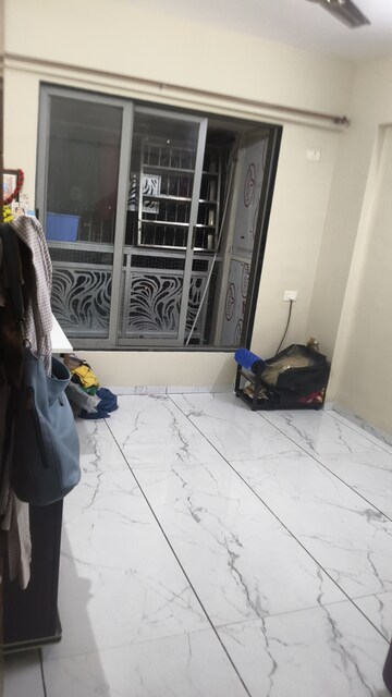 Living Room in 2 BHK Apartment at Lodha Freshia, Dombivli East – for Rent