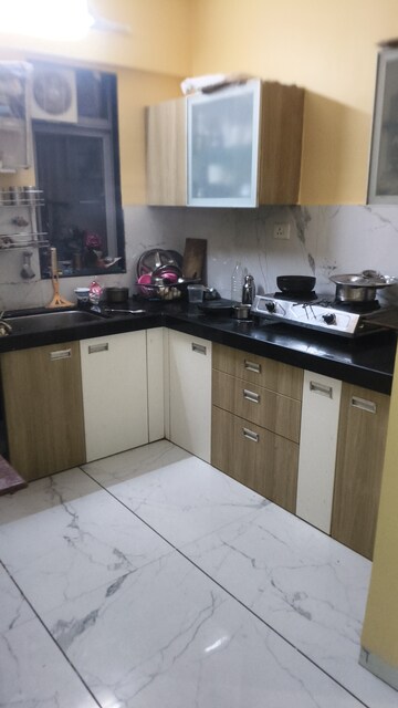 Kitchen in 2 BHK Apartment at Lodha Freshia, Dombivli East – for Rent