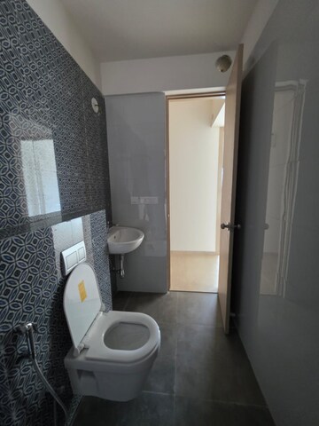 Bathroom in 4 BHK Apartment at Raj Infinia, Malad West – for Rent
