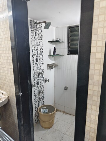 Bathroom in 1 BHK Apartment at Nagari Niwara CHS, Goregaon East – for Rent