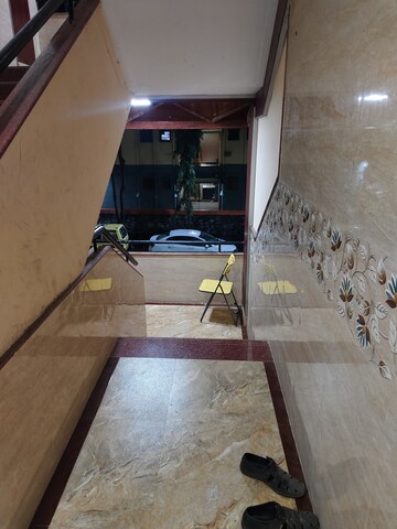 Stairs in 1 BHK Apartment at Nagari Niwara CHS, Goregaon East – for Rent