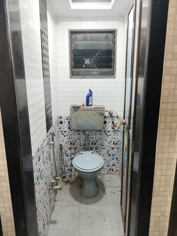 Bathroom in 1 BHK Apartment at Nagari Niwara CHS, Goregaon East – for Rent