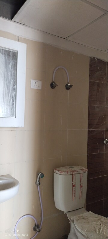 Bathroom in 2 BHK Apartment at Mahagun Mywoods, Sector 16c Greater Noida – for Rent