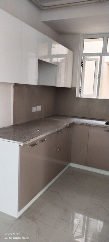 Kitchen in 2 BHK Apartment at Mahagun Mywoods, Sector 16c Greater Noida – for Rent