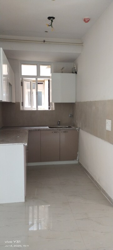 Kitchen in 2 BHK Apartment at Mahagun Mywoods, Sector 16c Greater Noida – for Rent