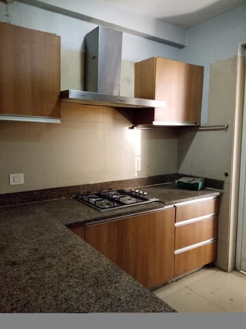 Kitchen in 5 BHK Apartment at Emaar Commonwealth Games Village, Patparganj – for Rent