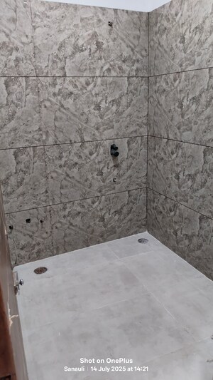 Bathroom in 4 BHK Apartment at Dhakoli – for Sale