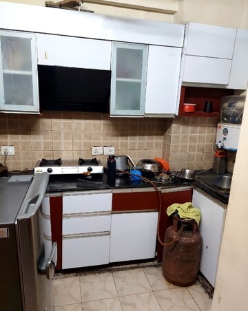 Kitchen in 2.5 BHK Apartment at Today Ridge Residency, Sector 135 – for Rent