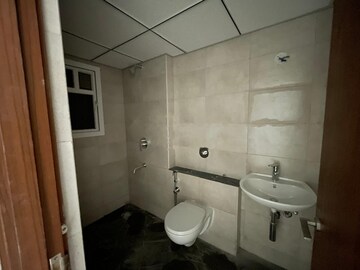 Bathroom in 2 BHK Apartment at Bricks and Milestones Wonderwall, Sompura – for Sale