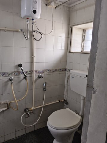 Bathroom in 1 BHK Apartment at Vile Parle West – for Rent