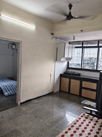 Living Room in 1 BHK Apartment at Vile Parle West – for Rent