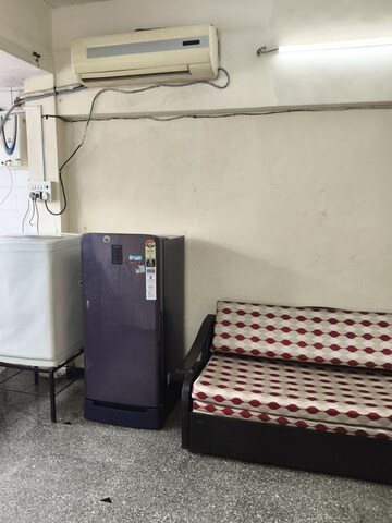 Living Room in 1 BHK Apartment at Vile Parle West – for Rent