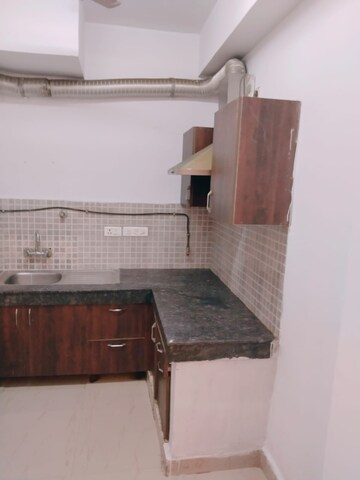 Kitchen in 2.5 BHK Apartment at Nimbus The Golden Palm, Sector 168 – for Rent