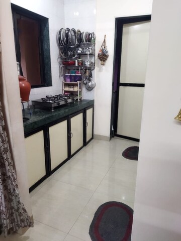Kitchen in 1.5 BHK Apartment at Om Sai Niwas Kalundre, Kalundre – for Sale