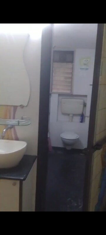 Bathroom in 1 BHK Apartment at Vile Parle East – for Rent
